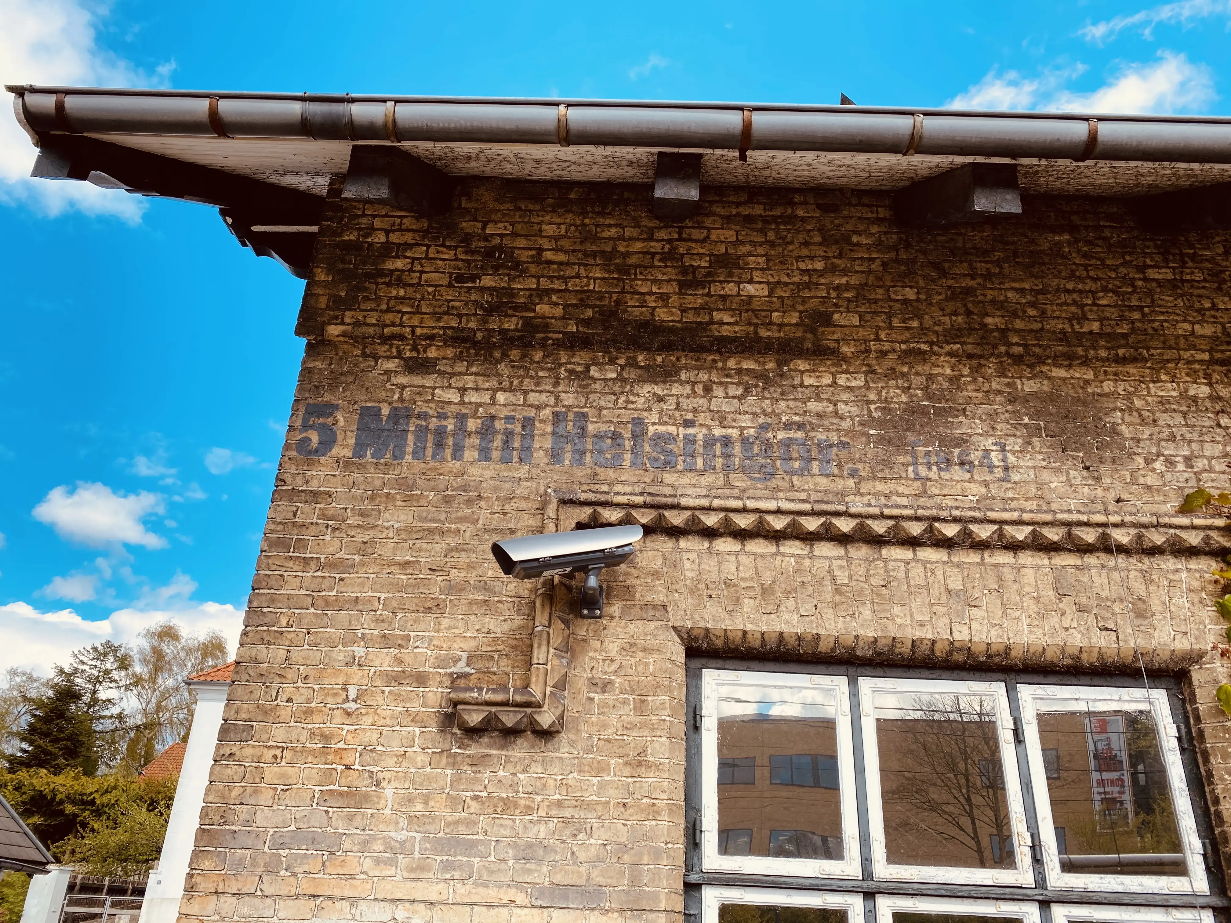 Billede af Birkerød Station med bemaling: 5 Miil til Helsingör [1864].