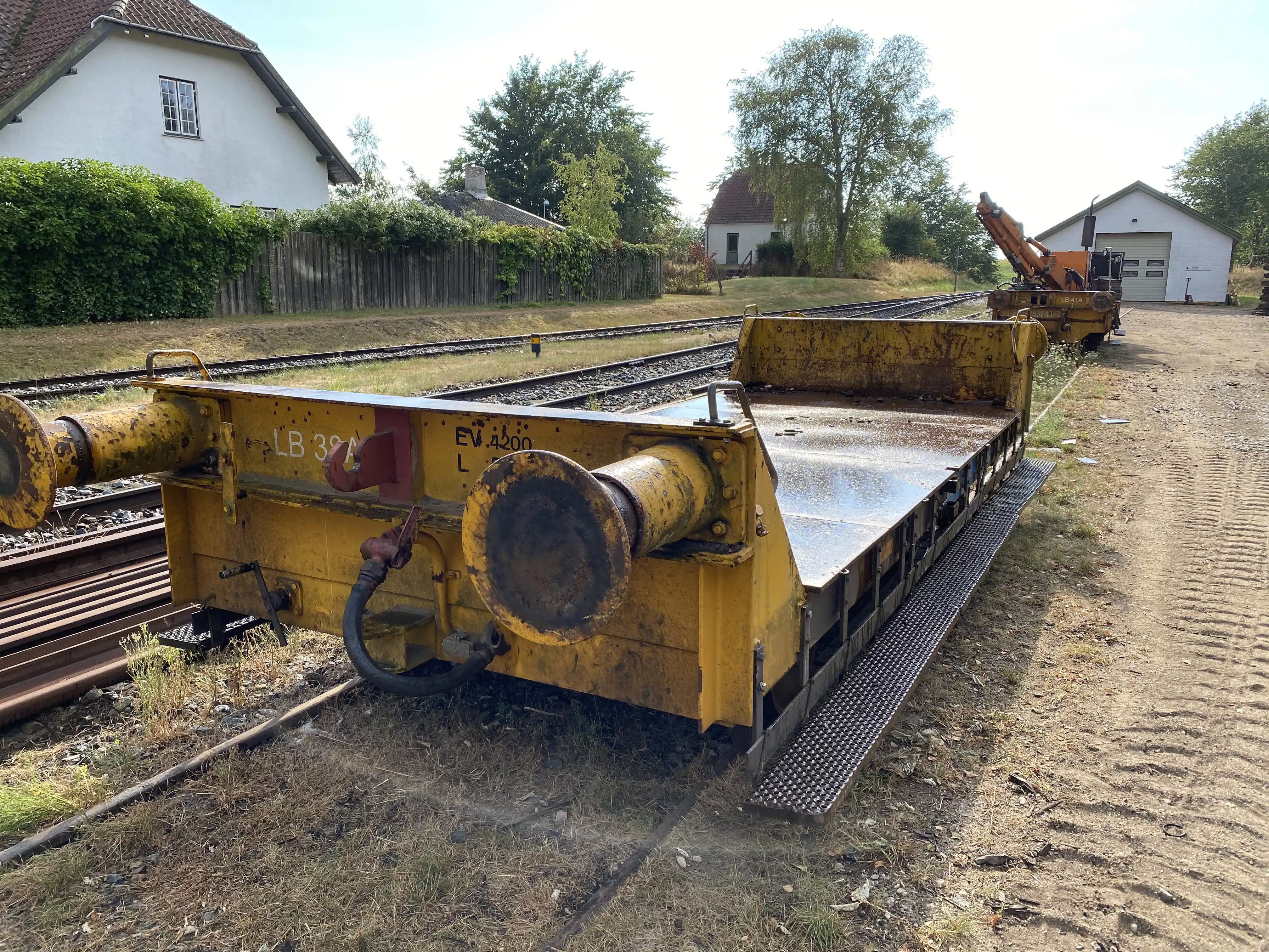 Billede af tog ud for Firhøj Station. Billede af tog ud for Firhøj Station.