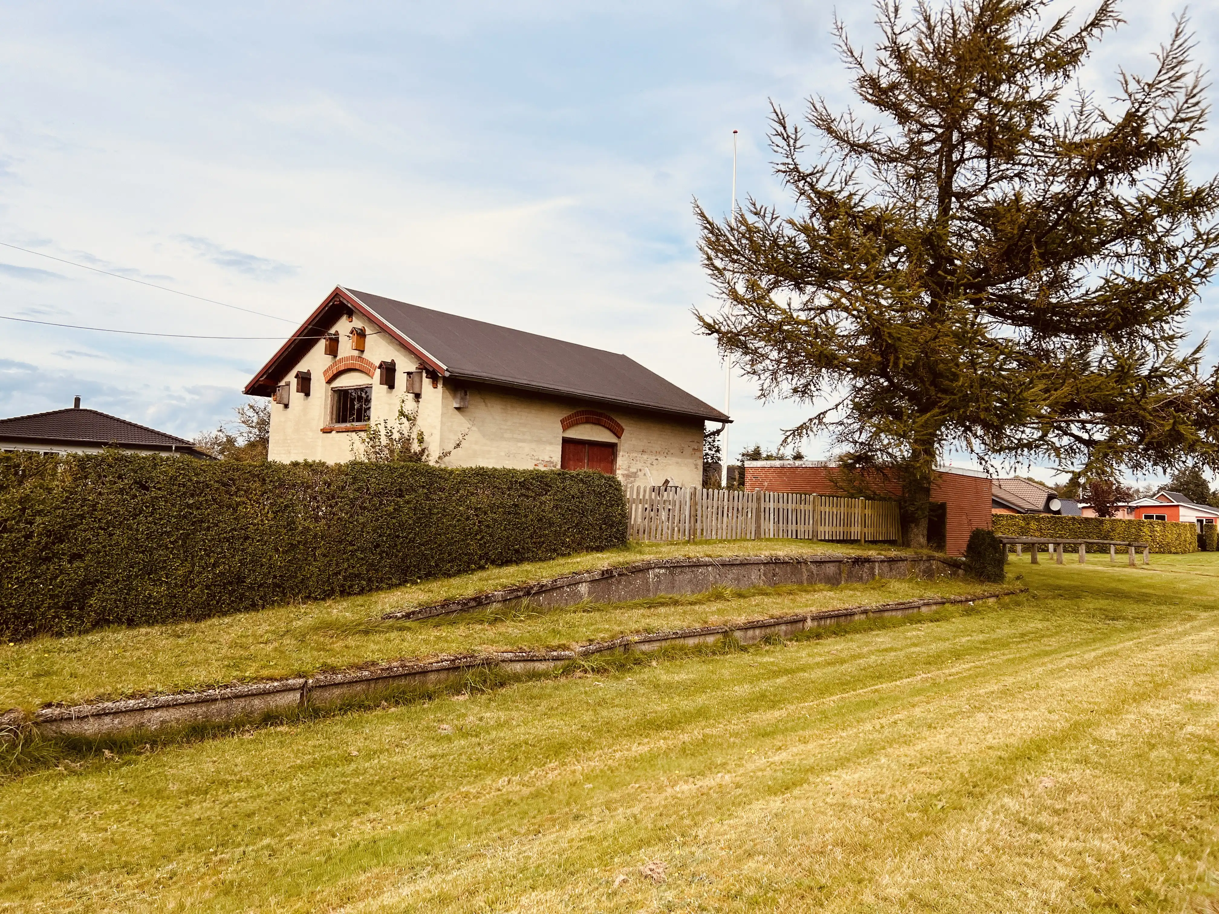 Billede af Ilskov Holdeplads’ varehus.